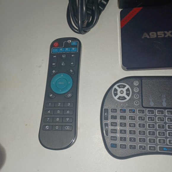 Compact Smart TV Box with Remote - Picture 3 of 13
